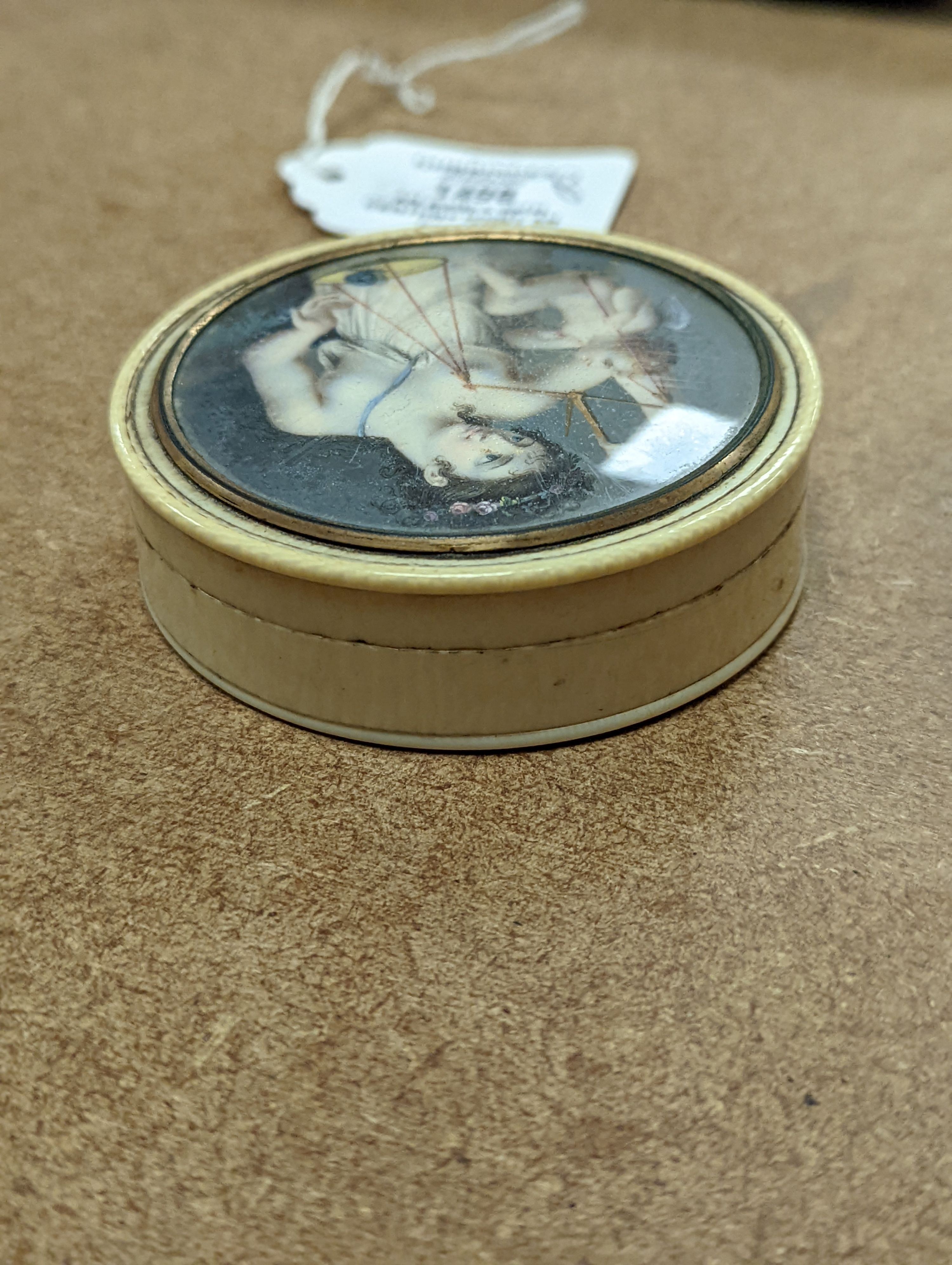 An early 19th century ivory and tortoishell box with inset miniature of Themis to cover, 8cm.